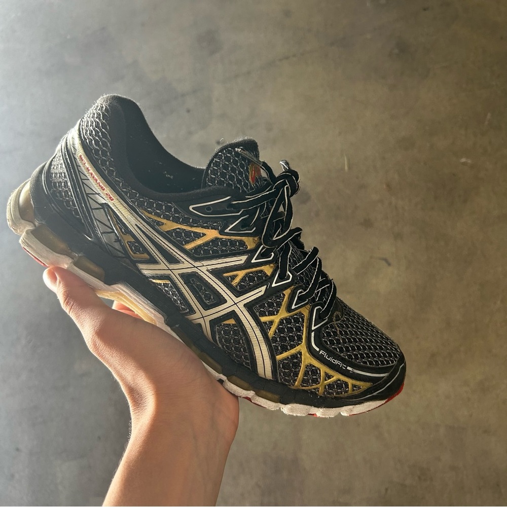 Asics Black and Gold Athletic Shoes with Gel Cushioning